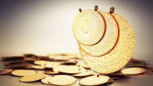 Full, Half and Quarter Turkish Jewelry Gold Coins in Front and Back Views on Top of Turkish Jewelry Gold Coin Stack on Infinite Background